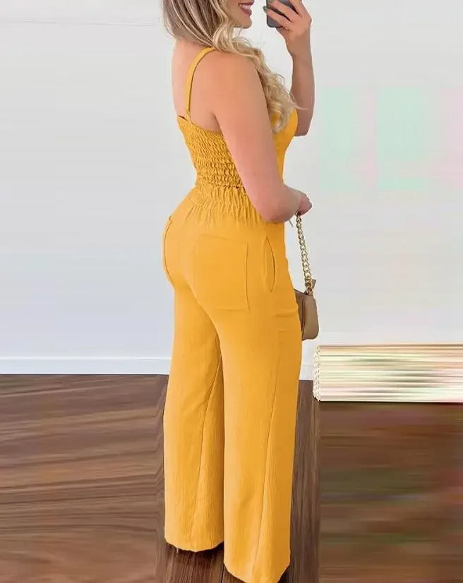 Spaghetti stropp V-hals ryggløs jumpsuit