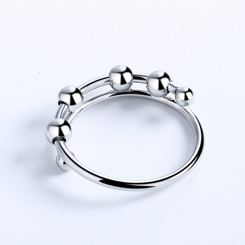 Roter fritt beroligende fidget-ring