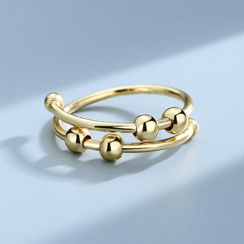 Roter fritt beroligende fidget-ring