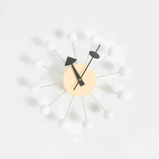 Dekorativ Veggklokke i Metall med Sunburst Design 7