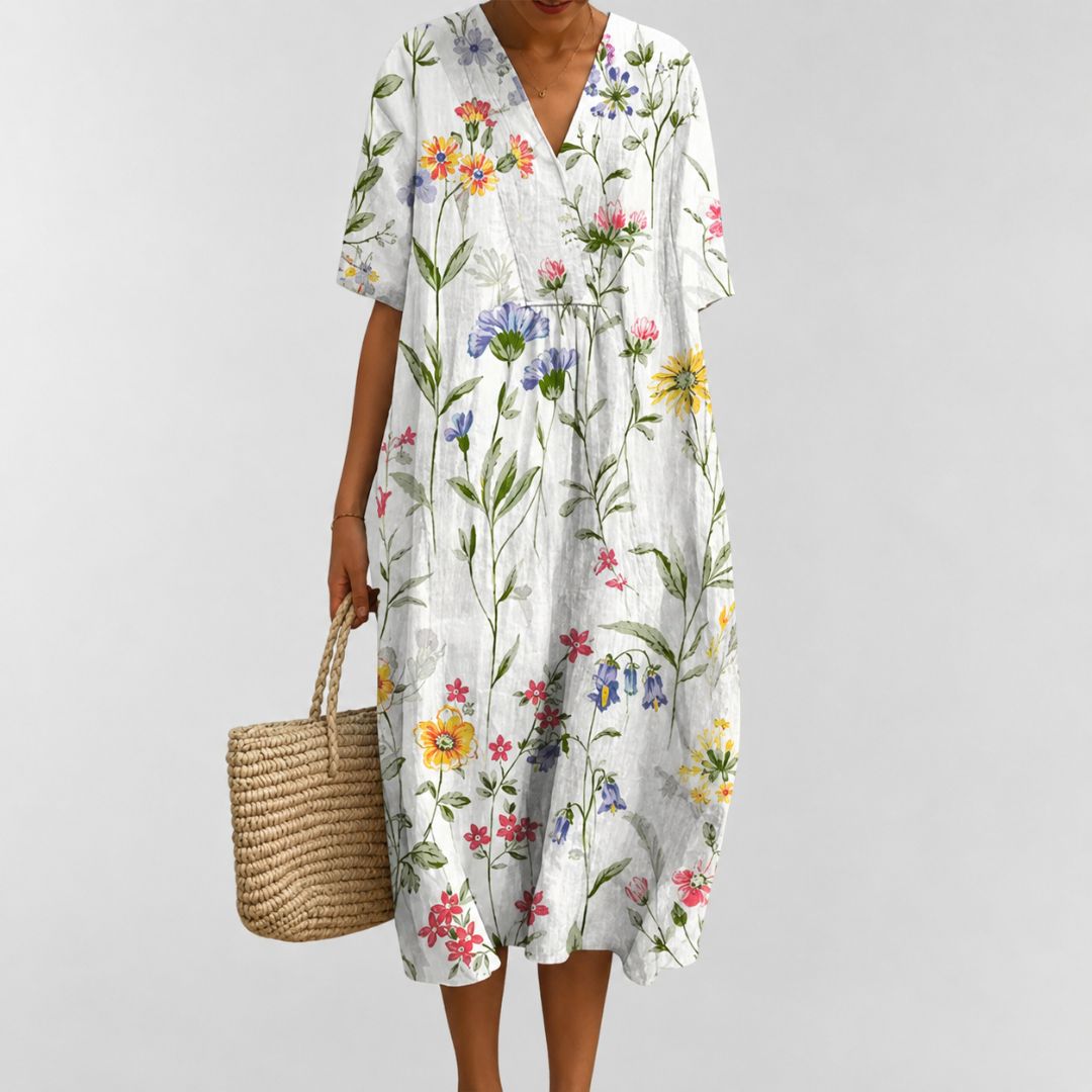 Løs sommerkjole med blomsterprint til dame 1