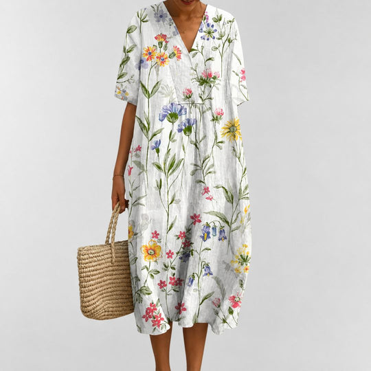 Løs sommerkjole med blomsterprint til dame 1