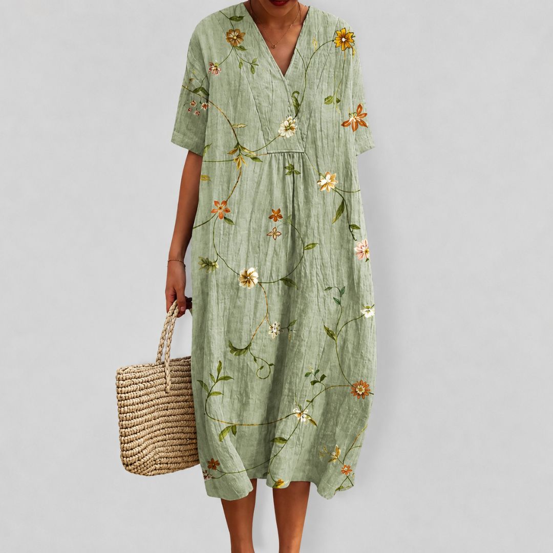 Løs sommerkjole med blomsterprint til dame 12