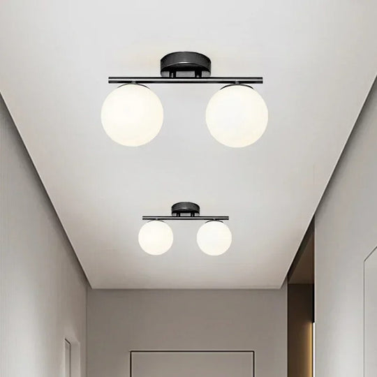 Taklampe i glasskule for stue og soverom 2