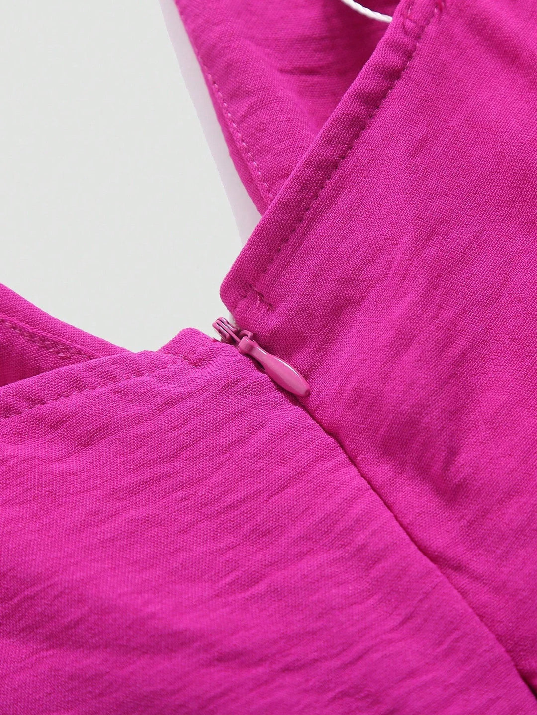 Plissert jumpsuit for kvinner
