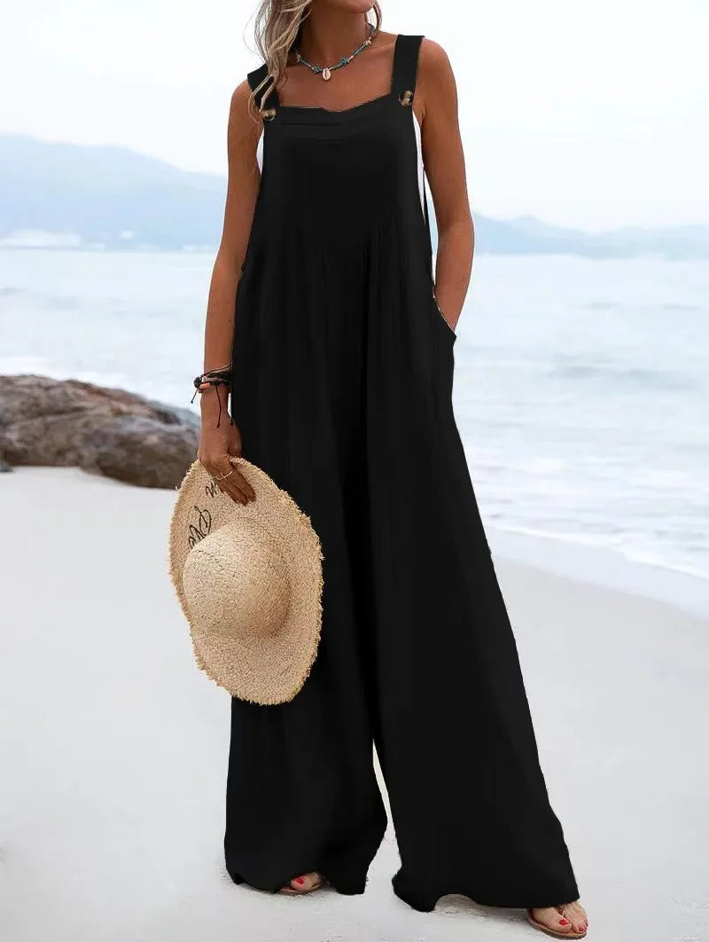 Ensfarget jumpsuit med bukseseler til dame