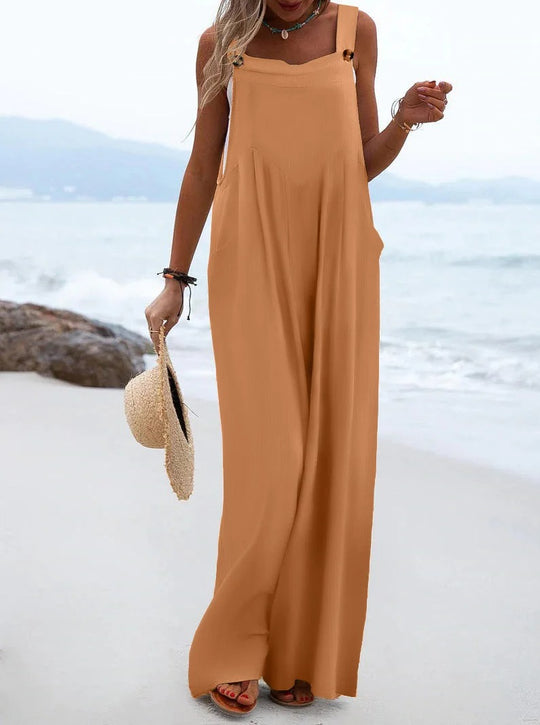 Ensfarget jumpsuit med bukseseler til dame