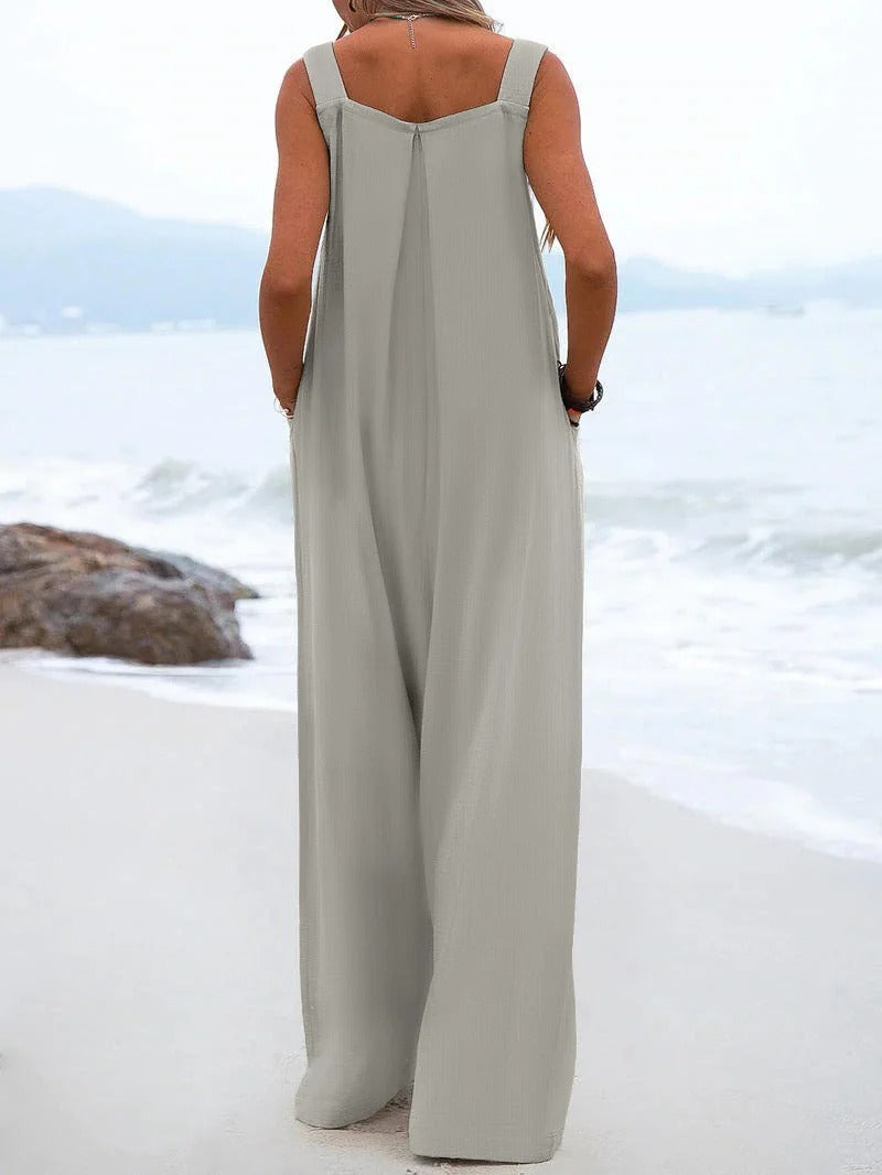 Ensfarget jumpsuit med bukseseler til dame