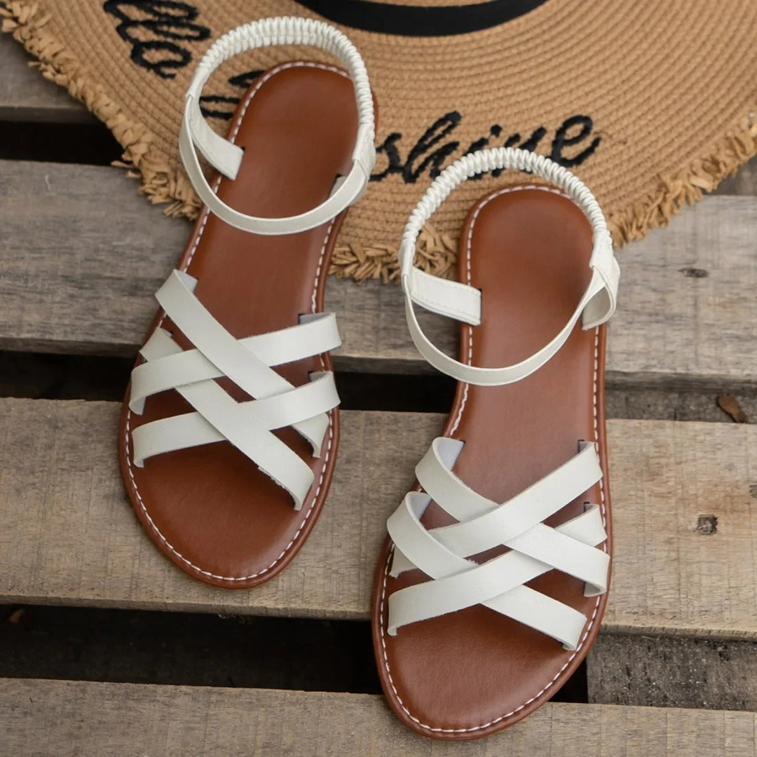 Flate sandaler med elastisk stropp for kvinner