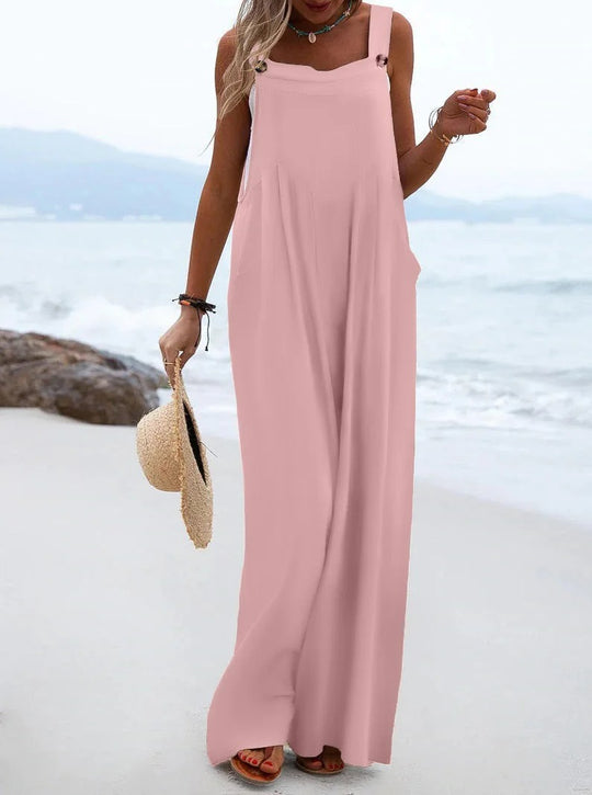 Ensfarget jumpsuit med bukseseler til dame