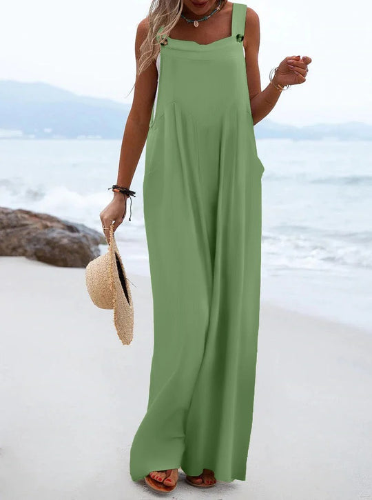 Ensfarget jumpsuit med bukseseler til dame