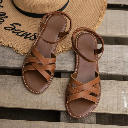 Flate sandaler med elastisk stropp for kvinner