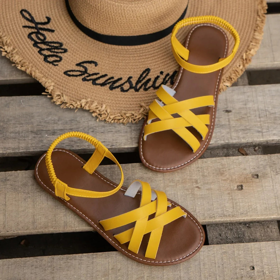 Flate sandaler med elastisk stropp for kvinner