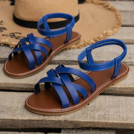 Flate sandaler med elastisk stropp for kvinner