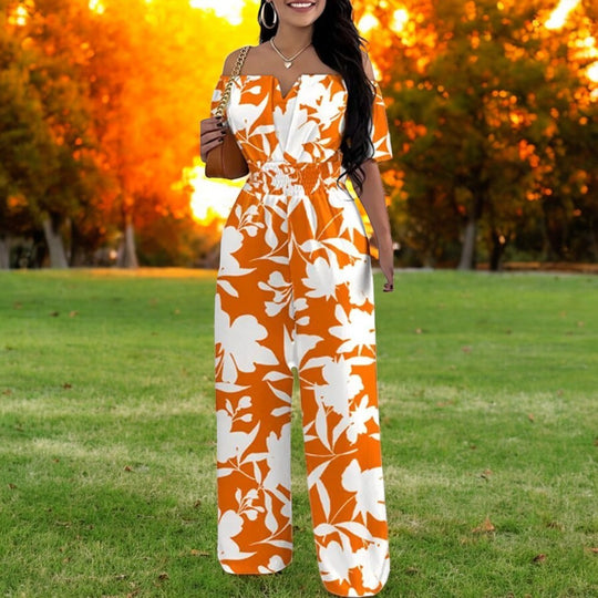 Jumpsuit med trykk uten skulder og smock i midjen