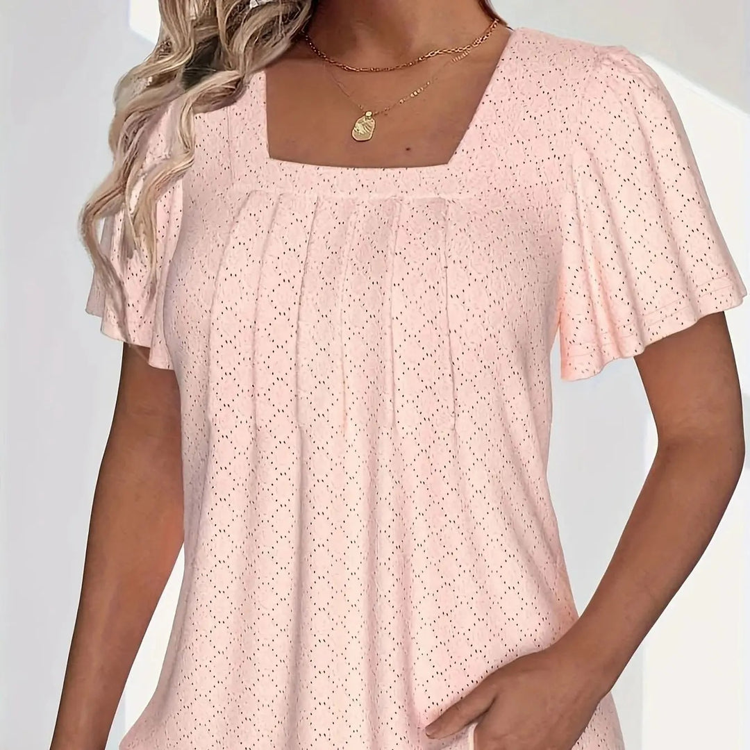 Damebluse med volanger og hull