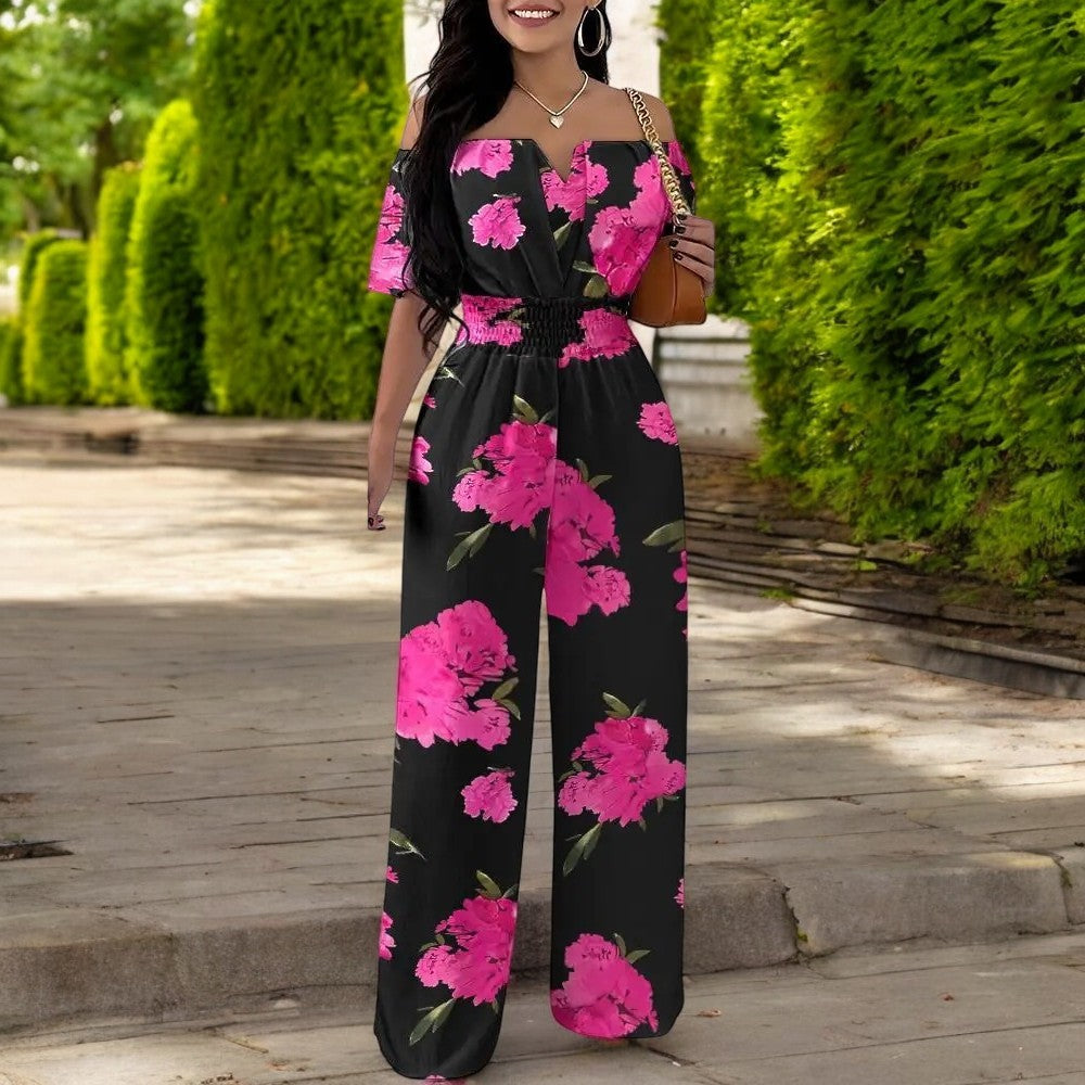 Jumpsuit med trykk uten skulder og smock i midjen