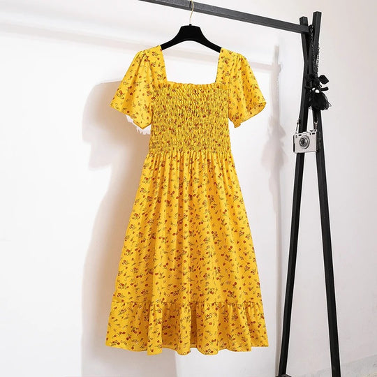Blomstret midikjole i chiffon for kvinner