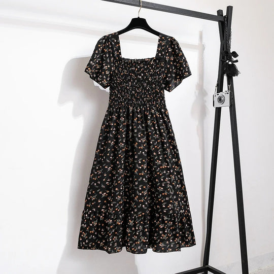 Blomstret midikjole i chiffon for kvinner