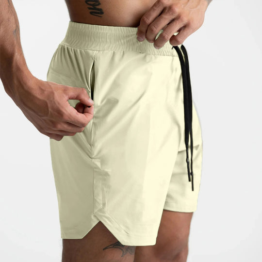 Herre shorts i hurtigtørkende sportstoff